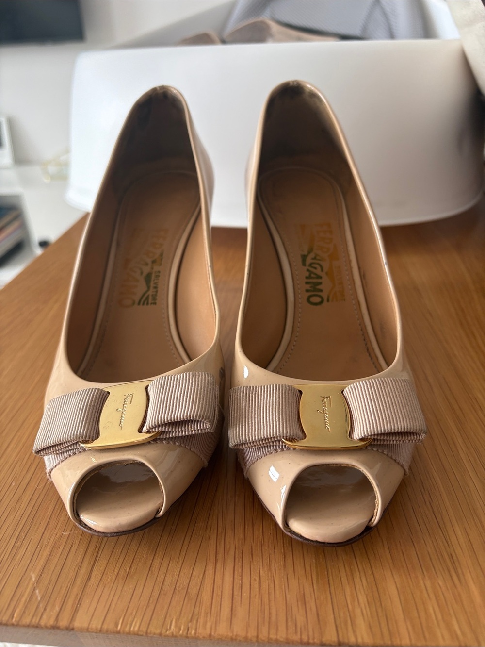 Salvatore Ferragamo Nude Patent Peep-Toe Pumps with Grosgrain Bow and Gold Plate